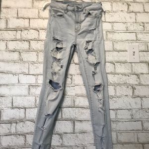 Light blue ripped American Eagle skinny jeans